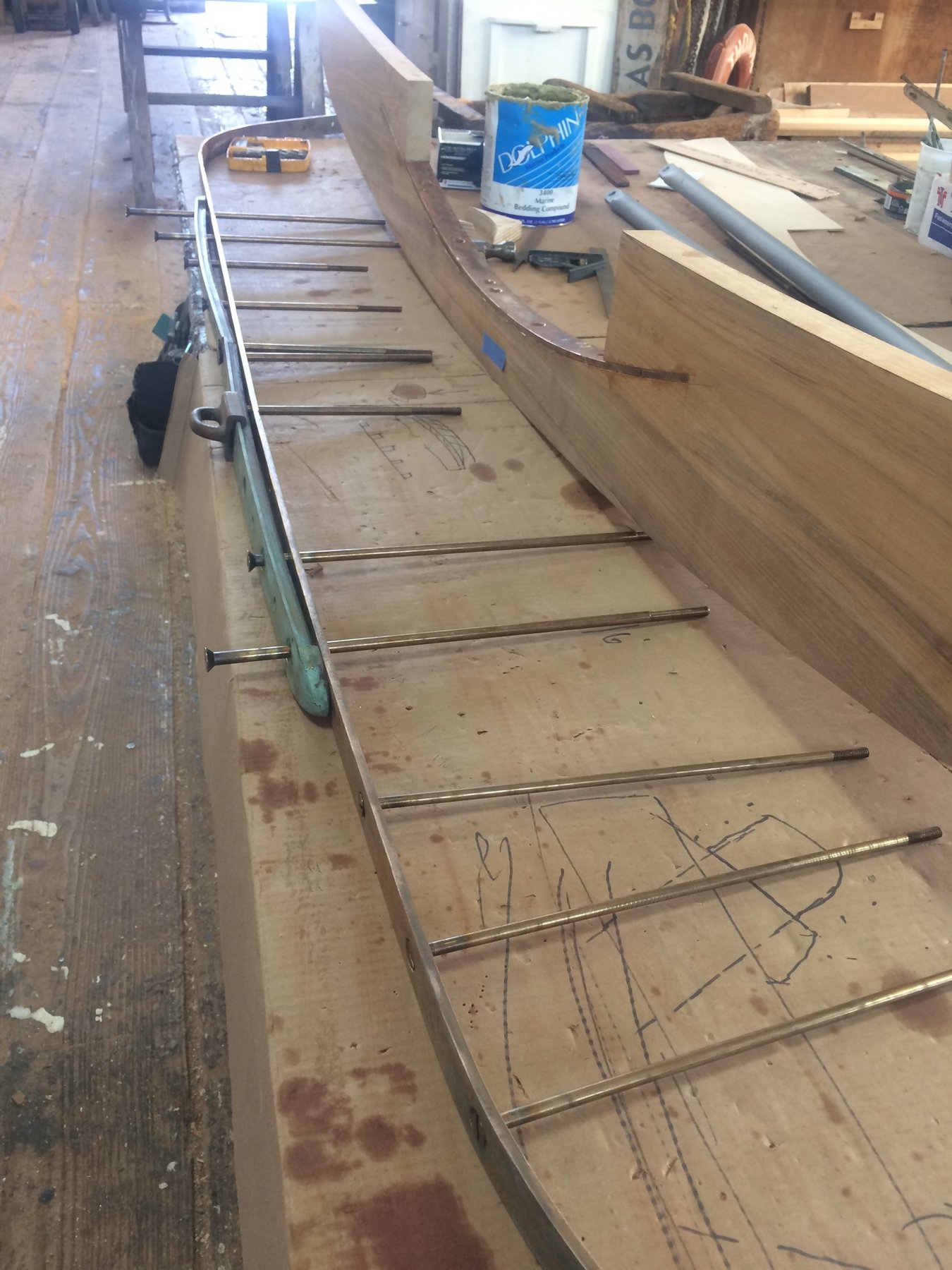Interior framing and structural details of the Merry Maiden's hull during restoration work, revealing the classic wooden construction of this 1946 Philip Rhodes design.