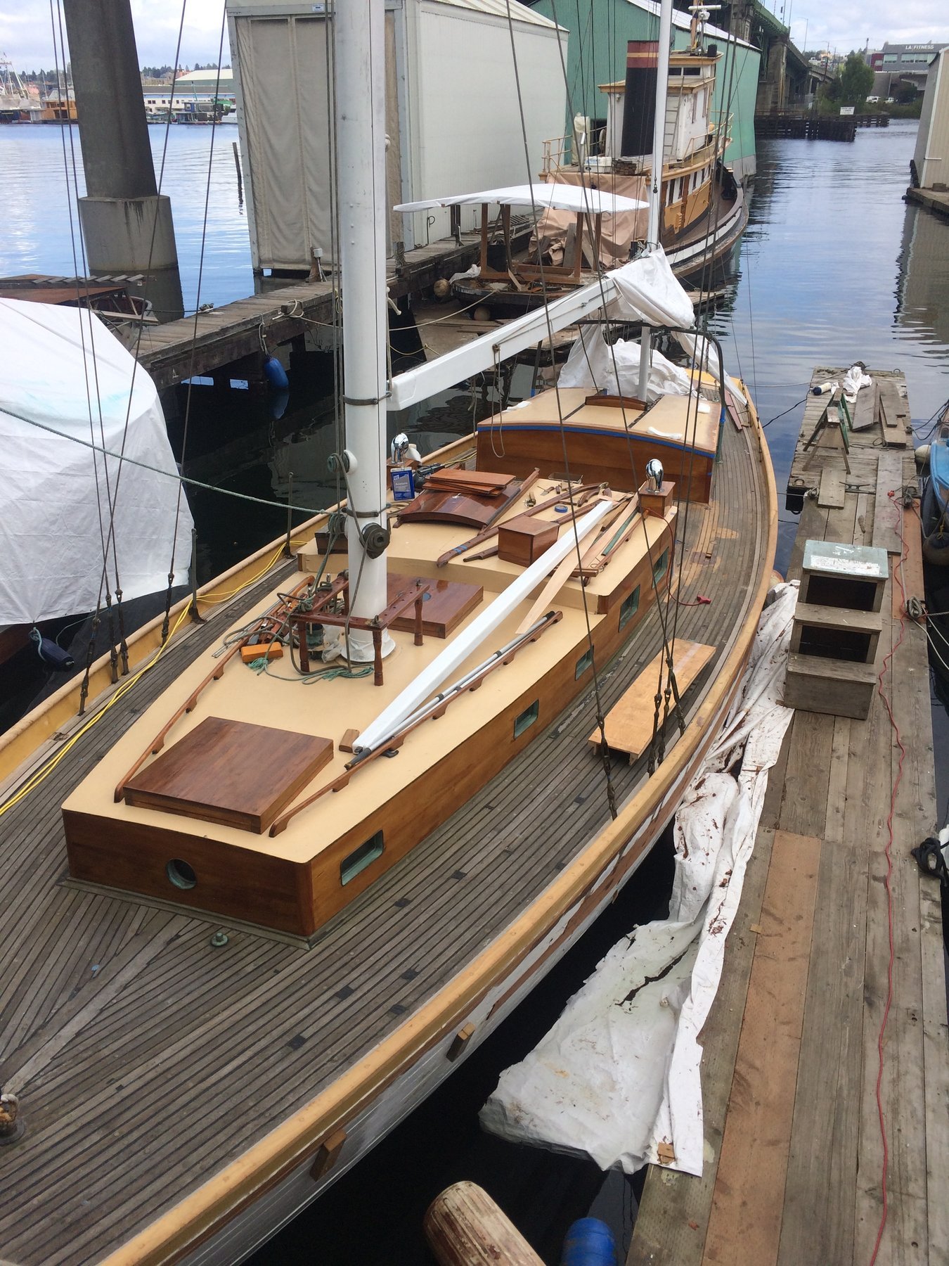 The classic 1946 Philip Rhodes-designed Merry Maiden rests on the hard in the Puget Sound, her graceful wooden hull and traditional lines preserved for the next generation of sailors.